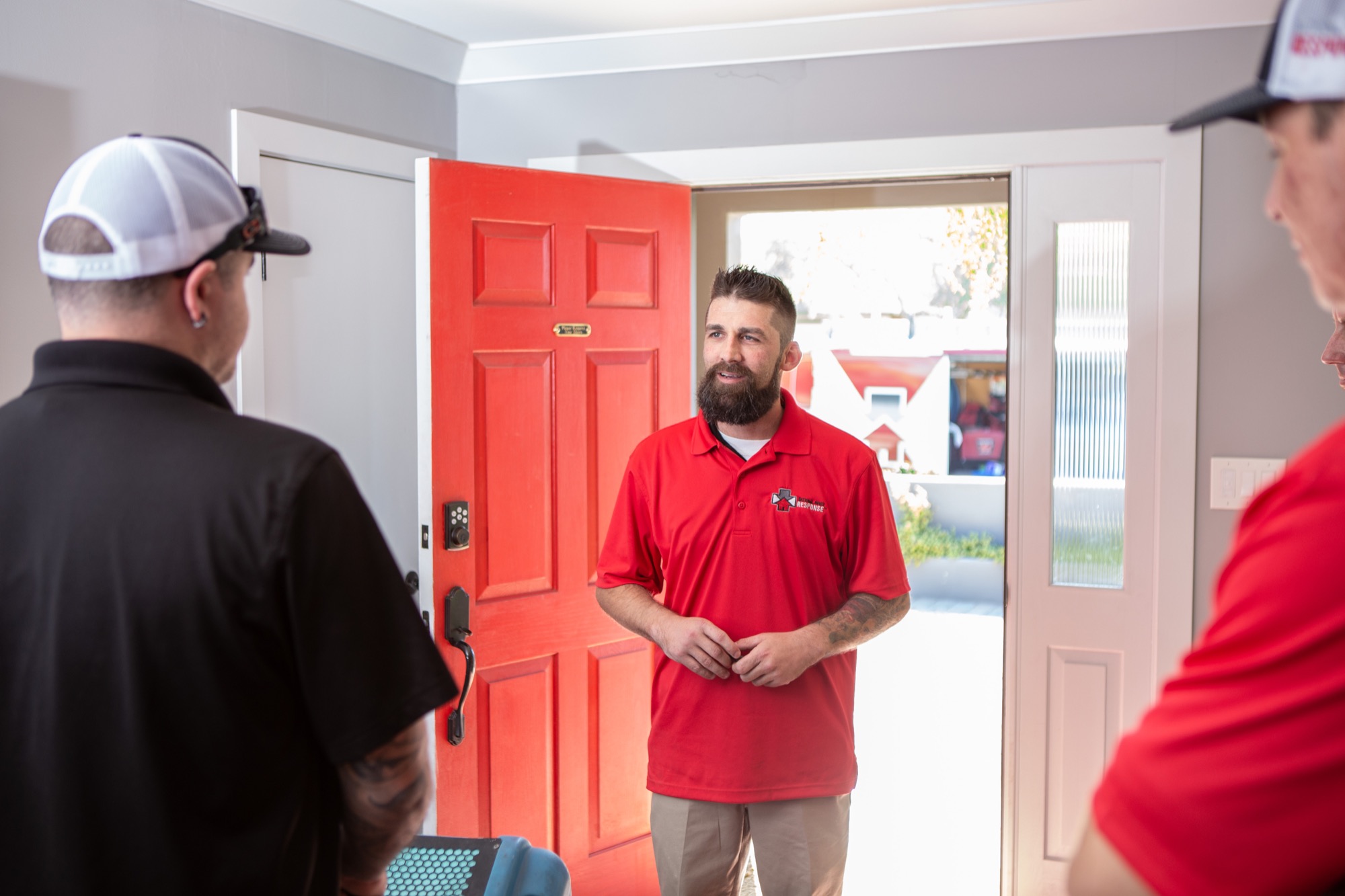 National First Response technicians greeting an Arizona homeowner